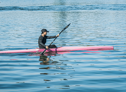 person in kayak on the water